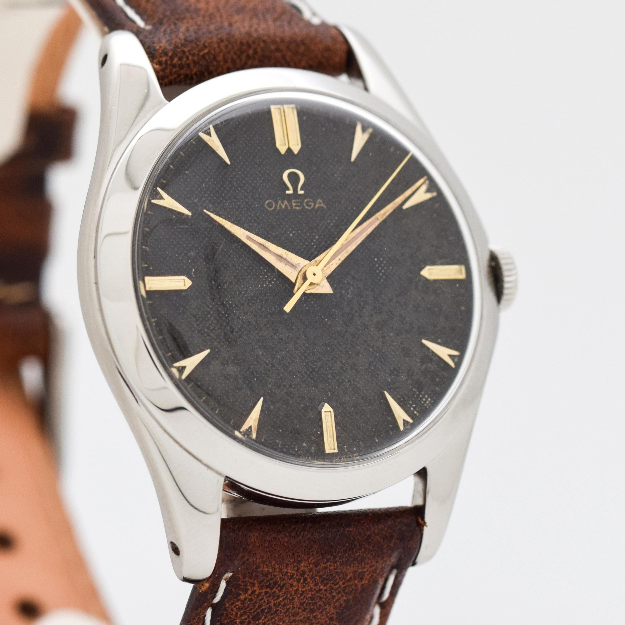 1952 Vintage Omega Ref. 2504-14-SC Stainless Steel watch with Original Black Waffle Textured Dial with Applied Gold Color Elongated Beveled Arrow and Pointed Tip Bar/Baton Markers. Case size, 36mm x 42mm lug to lug (1.42 in. x 1.65 in.) - Powered by