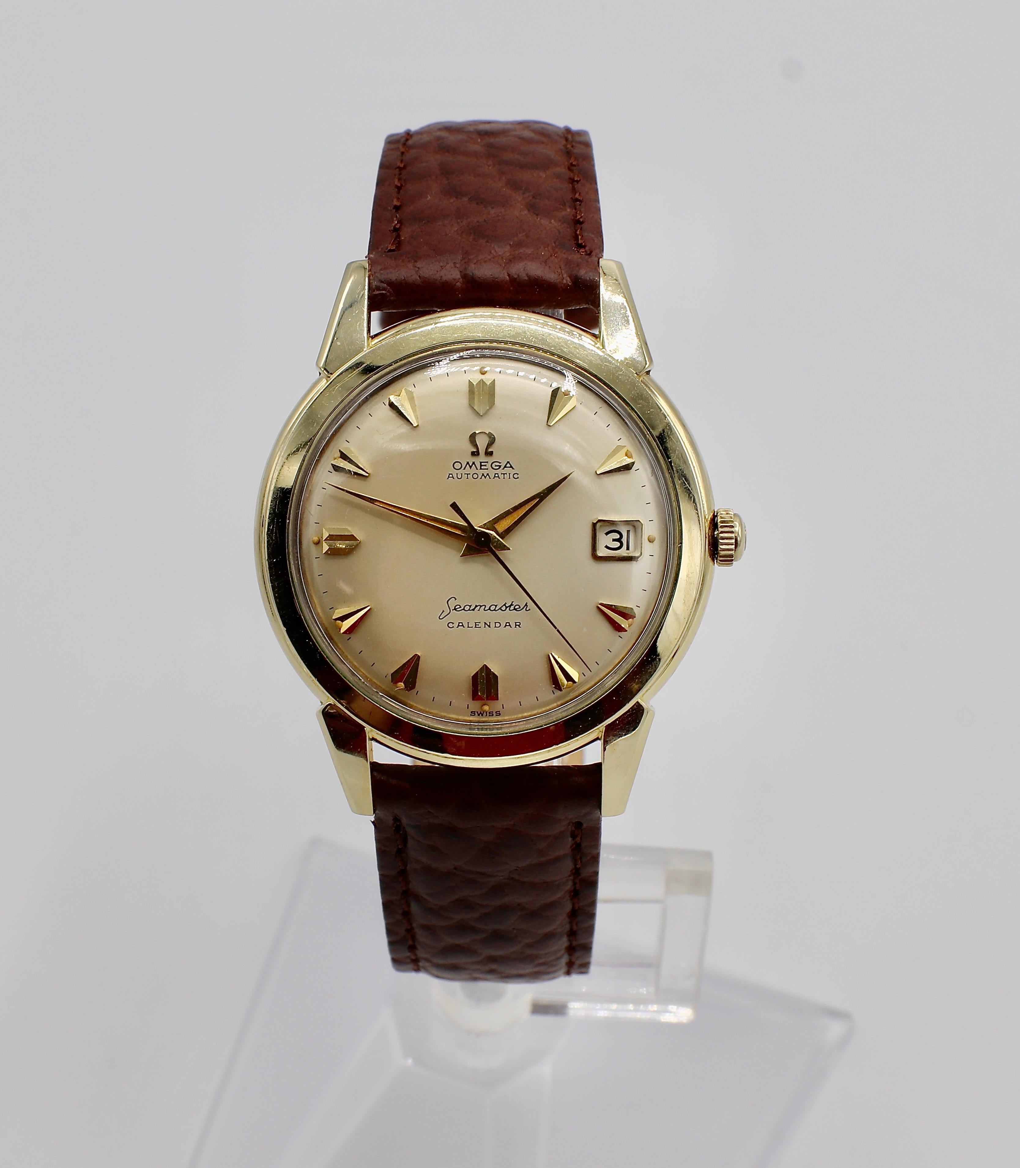 Vintage Omega Seamaster Automatic Calendar Gold Filled Watch on Brown Leather Speidel Strap 

Metal: 14K Gold Filled 
Case: 35MM
Dial: Champaign
Crystal: Acrylic 
Strap: Brown leather Speidel 
Movement: Automatic
