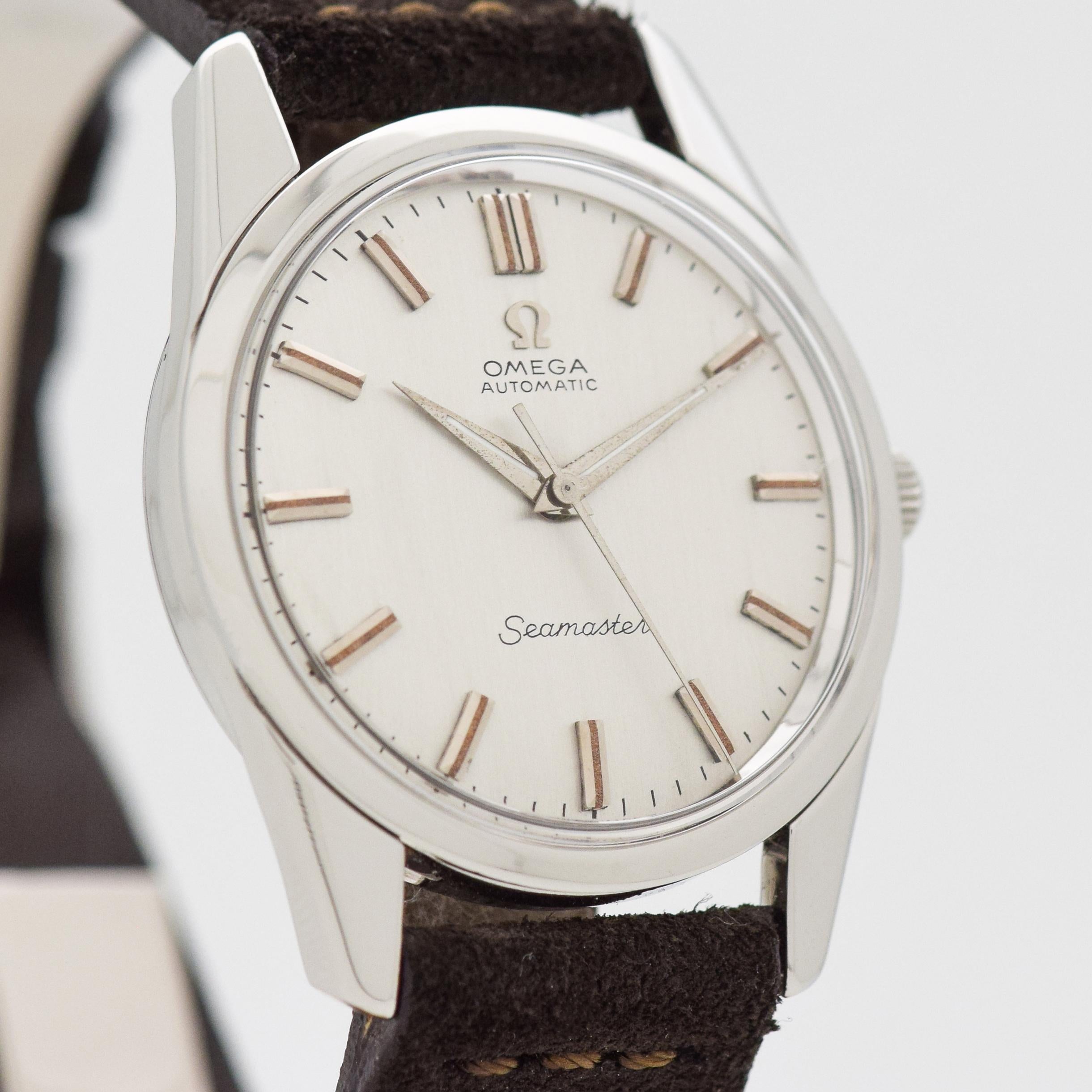 1959 Vintage Omega Seamaster Automatic Ref. 14700 2 SC Stainless Steel watch with Original Silver Dial with Applied Steel Beveled Stick/Bar/Baton Markers. 33mm x 41mm lug to lug (1.3 in. x 1.61 in.) - 24 jewel, automatic caliber movement. Sueded