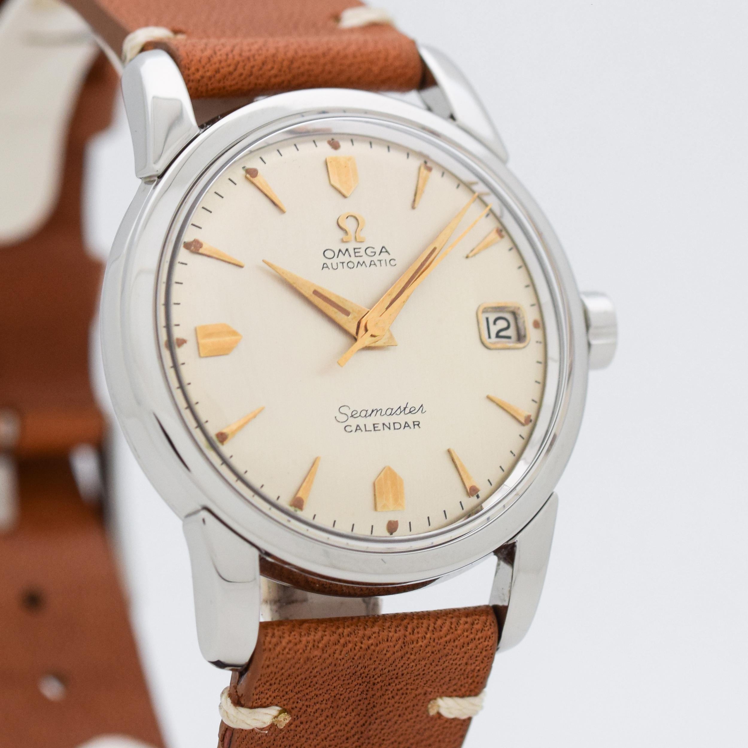 1957 Vintage Omega Seamaster Calendar Reference 2846-3-SC. Stainless Steel case, that measures in at 34mm wide. Original, but restored silver dial. Date function. Powered by a 20-jewel, automatic caliber movement. Equipped with a Genuine Horween