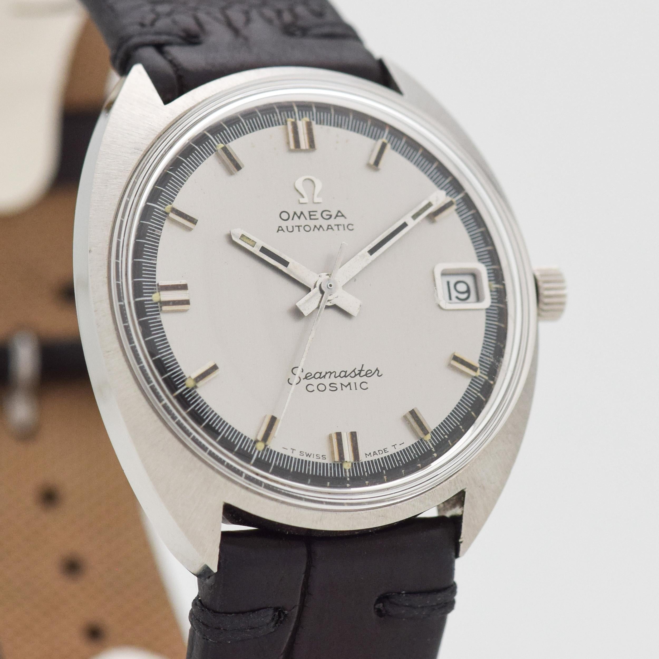 1970 Vintage Omega Seamaster Cosmic Reference 166.023. Stainless Steel, C-shaped watch case. 33mm wide. Original dial with date function. Powered by a 24-jewel, automatic caliber movement. Equipped with a black-colored, Genuine Alligator