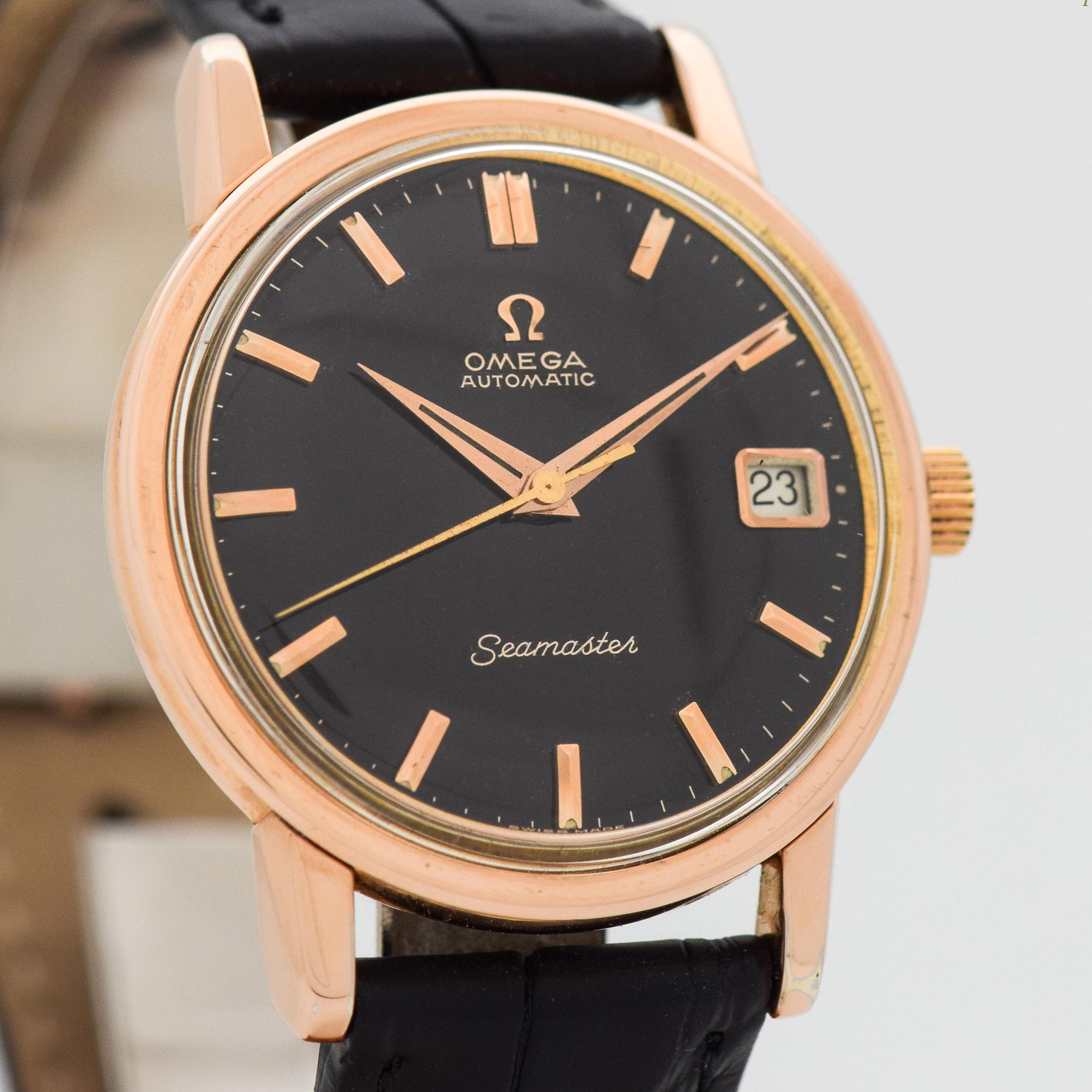1963 Vintage Omega Seamaster Ref. 166.003 14k Rose Gold Bezel and Caped Lugs with Stainless Steel Case Back with Original Black Dial with Rose Gold Beveled Stick/Bar/Baton Markers with Original Omega Box. 34mm x 41mm lug to lug (1.34 in. x 1.61 in.)