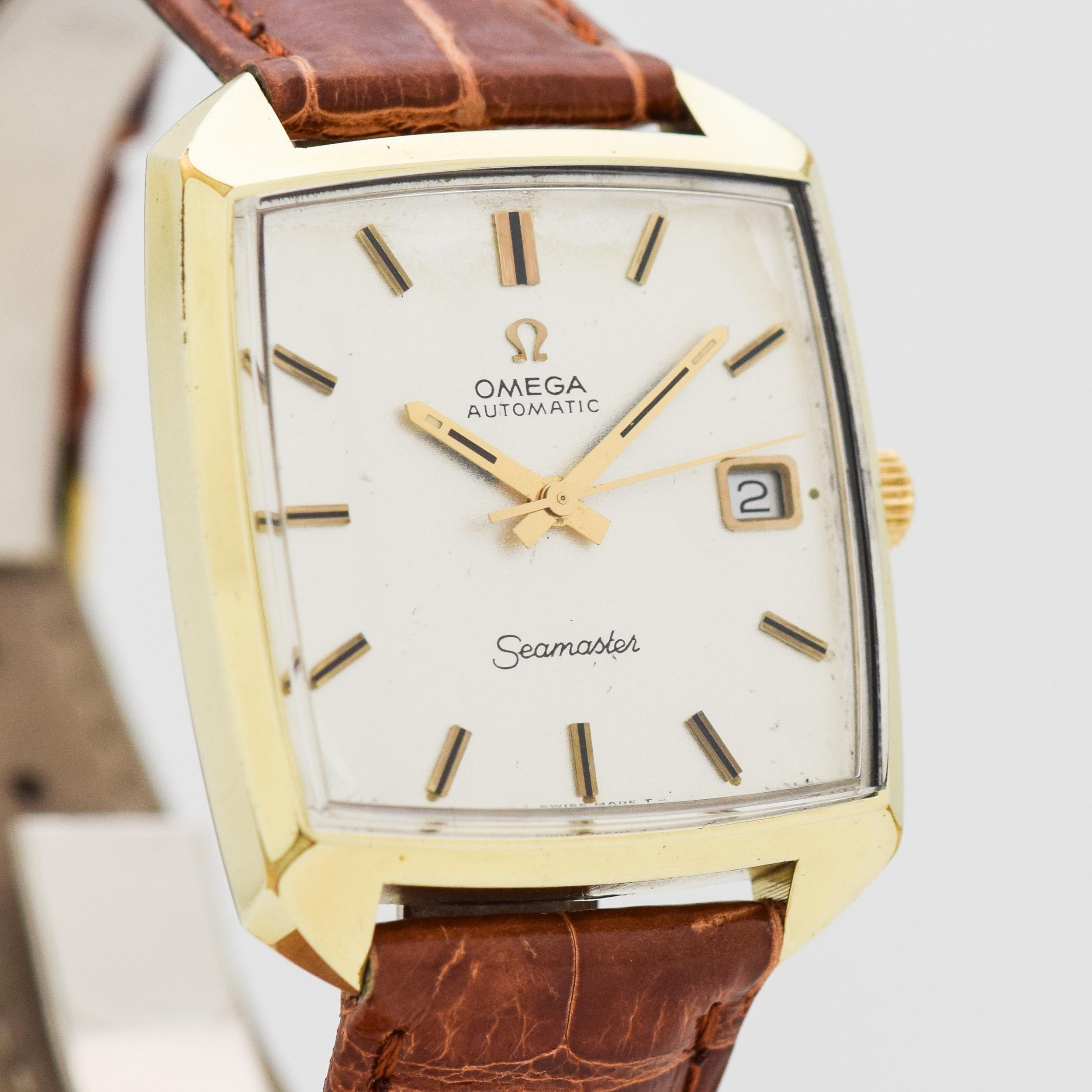 1970 Vintage Omega Seamaster Compressor Automatic Date 18k Yellow Gold Plated with Stainless Steel Case Back Watch with Original Silver Dial with Applied Gold Color Stick/Bar/Baton Markers with Black Inlay. 33mm x 39mm lug to lug (1.3 in. x 1.54