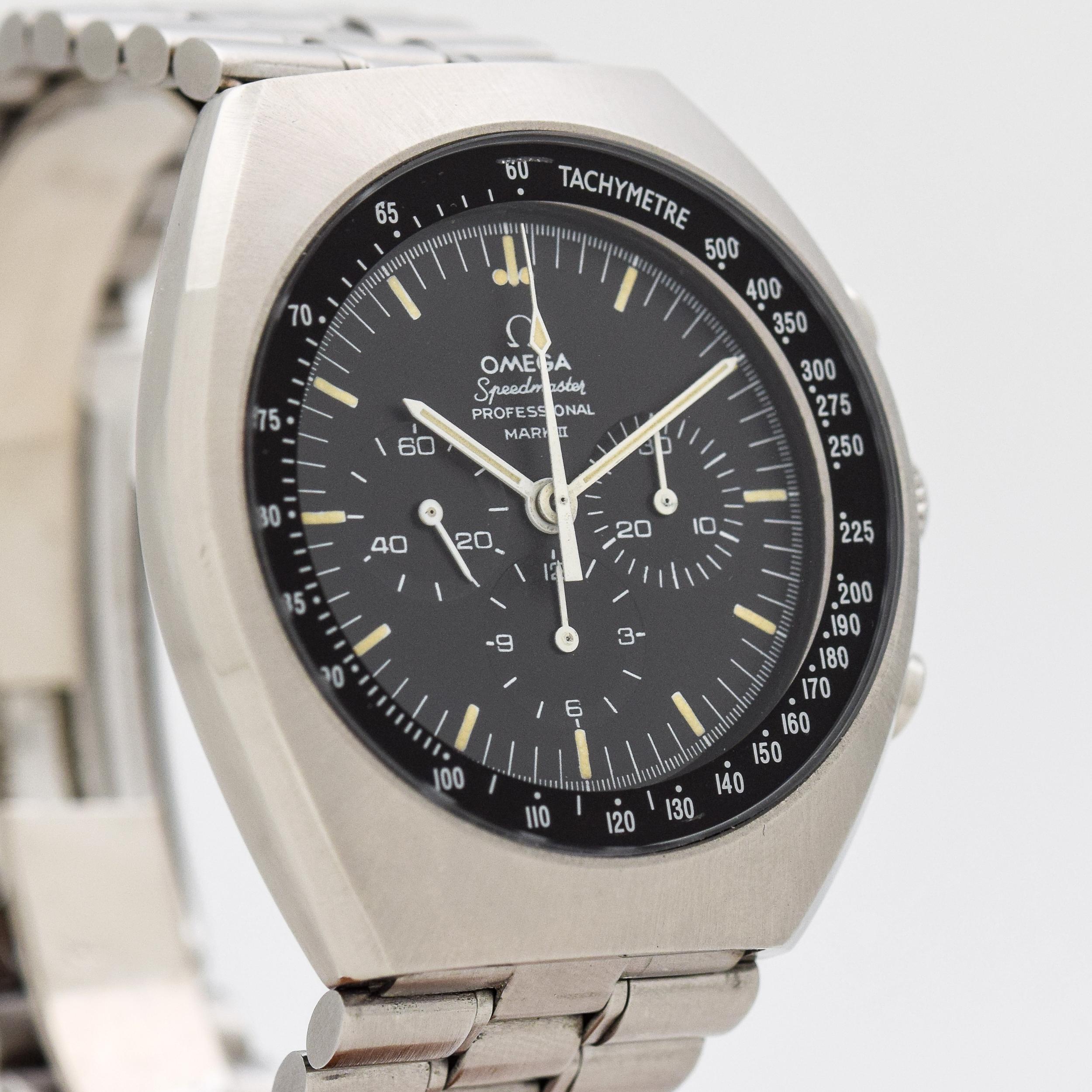 1970 Vintage Omega Speedmaster Mark II Ref. 145.014 Stainless Steel watch with Original Black Dial with White Luminous Stick/Bar Markers with Original Omega Stainless Steel Bracelet. 42mm x 47mm lug to lug (1.65 in. x 1.85 in.) - 17 jewel, manual