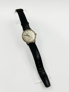 Montre-bracelet Omega vintage bicolore avec petite seconde, Suisse, CIRCA 1940