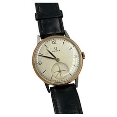 Montre-bracelet Omega vintage bicolore avec petite seconde, Suisse, CIRCA 1940