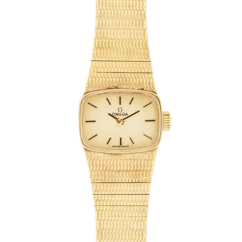 Coming with it’s original box and paperwork, this small vintage Omega is charming. The watch features a 9 carat yellow gold bracelet and case weighing 28 grams. Chevron markings denote the hours with the Omega logo sitting just below the 12.


Age: