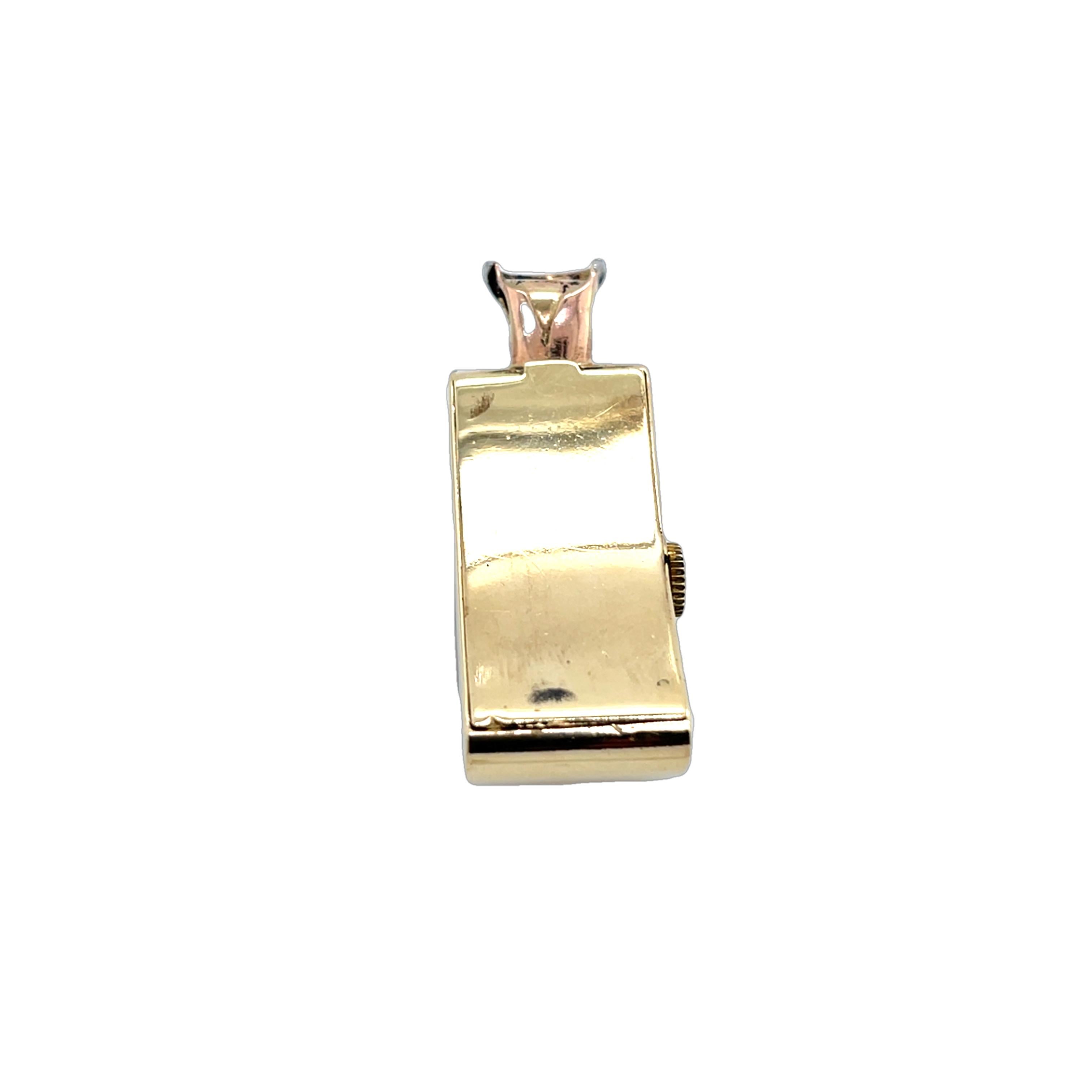 A charming vintage ladies' pendant watch crafted in 9ct yellow gold, adorned with sparkling diamonds and vibrant rubies. 
This elegant timepiece combines functionality with timeless beauty, 
making it a unique accessory and collectible treasure to