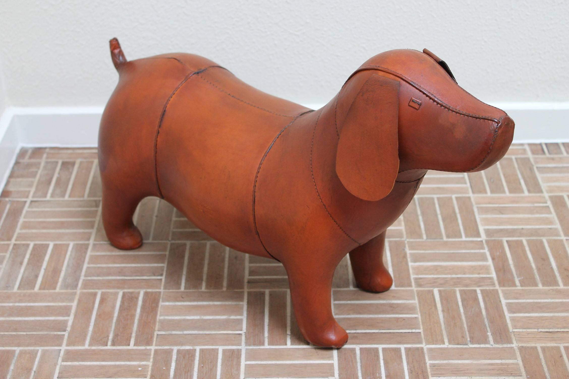 Large vintage Omersa leather dog footstool. 
Handmade in England.
Can be used as a foot tool, a great decorative interior object, childen's chair, desk accessorie.
Dog collectible - animal figurine. 
Great coloring. 
Excellent condition.