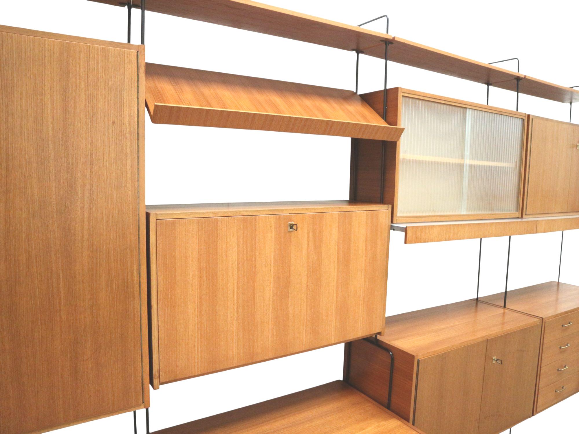 Wood Vintage Omnia wall system designed by Ernst Dieter Hilker in the 1960s For Sale