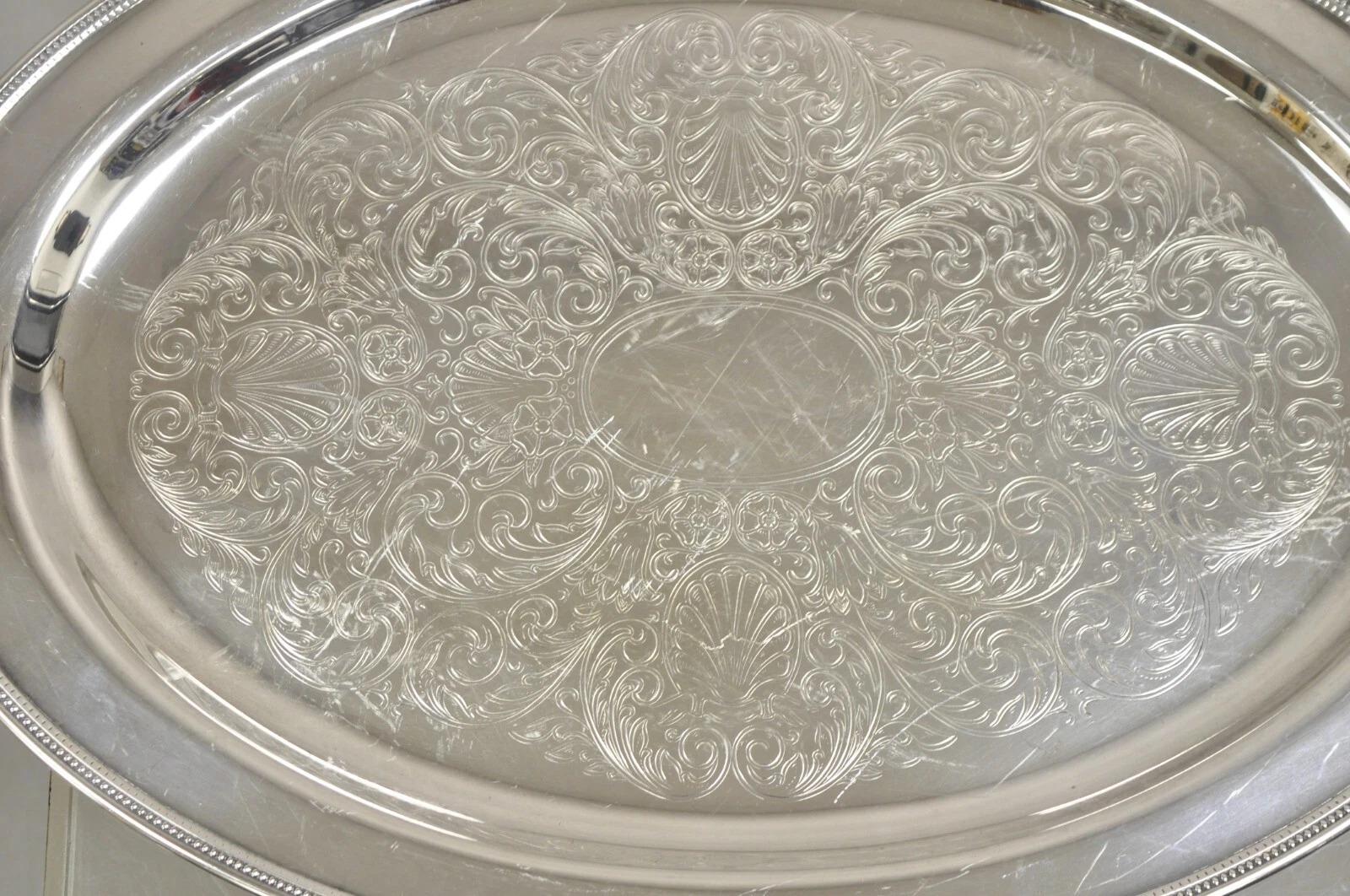 Vintage Oneida Edwardian Style Silver Plated Oval geätzt Servierplatte Tablett. CIRCA Spätes 20. Jahrhundert. Abmessungen: 1,5