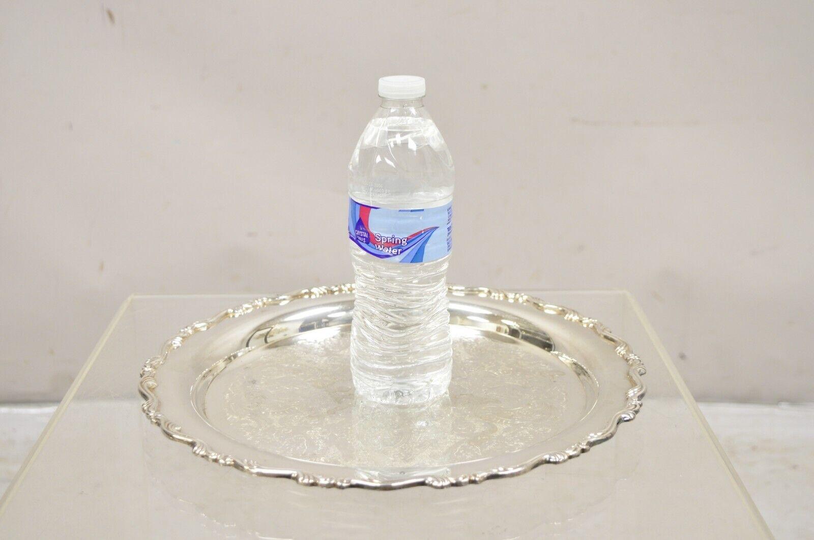 Vintage Oneida Georgian Scroll Silver Plated Round Etched Serving Platter Tray. Circa Late 20th Century. Measurements: 1