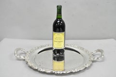 Bandeja de bar Oneida vintage plateada redonda con dos asas