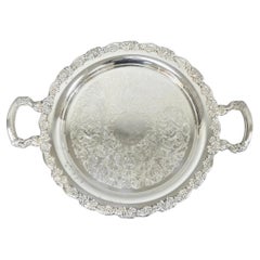 Bandeja de bar Oneida vintage plateada redonda con dos asas