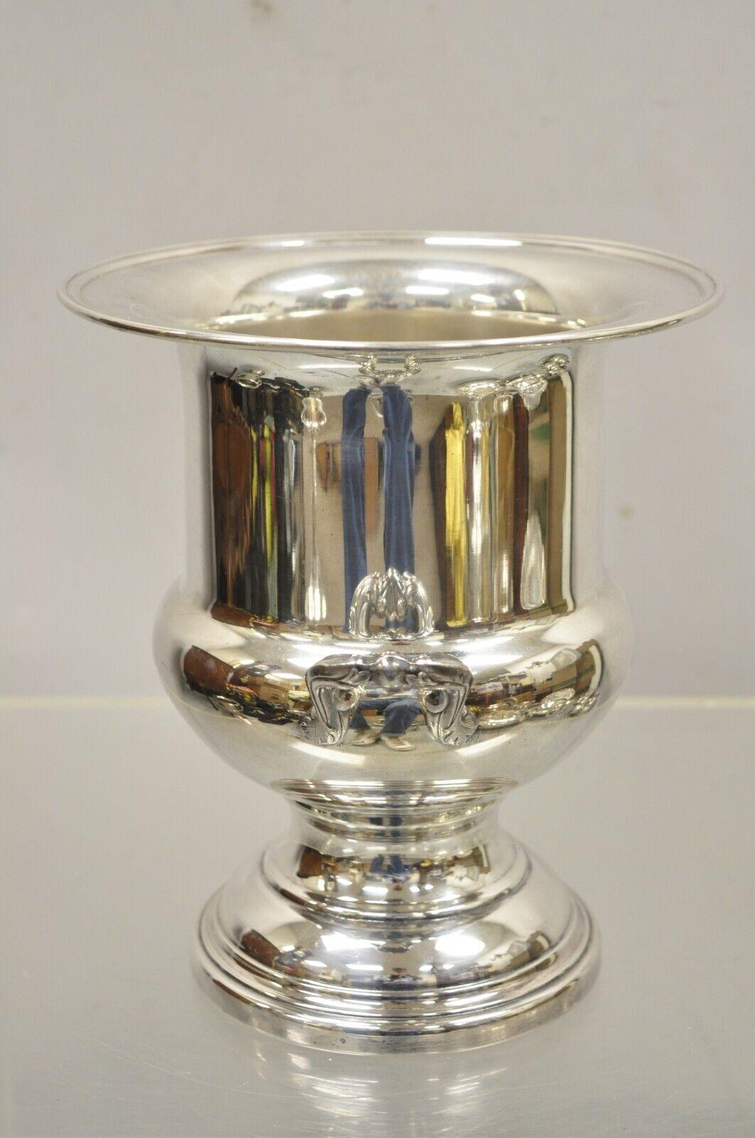 Vintage Oneida Silversmiths Trophy Cup Urn Champagne Bucket Ice Chiller.
Circa Mid to Late 20th Century. Measurements: 10