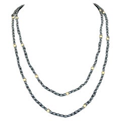 Collar vintage de cuentas de ónix y oro de 14k con cierre