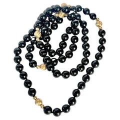 Perlenkette aus Onyx und 9 Karat Gold mit Perlen