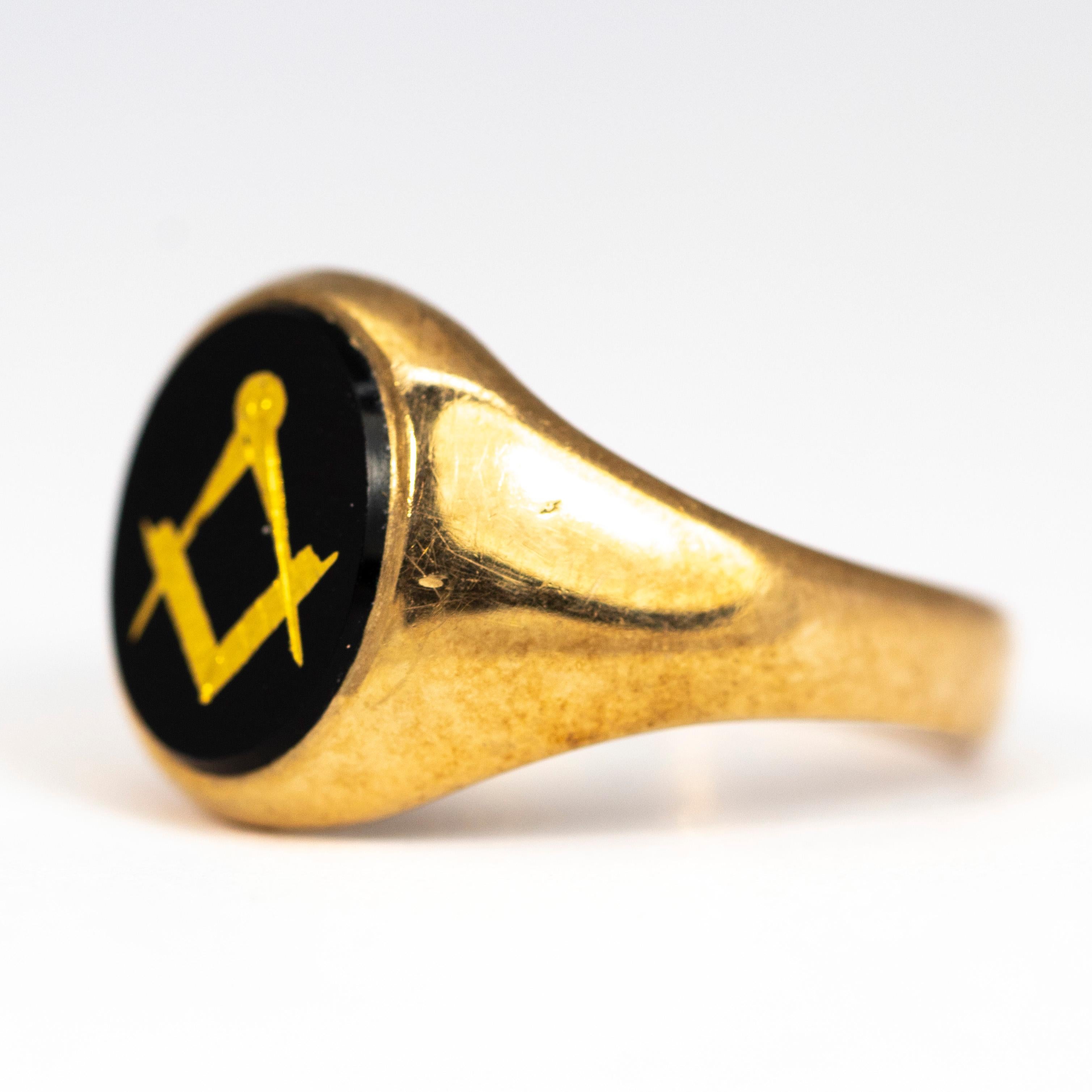 This masonic signet ring is modelled in 9 carat old and has a classic motif engraved in fine gold and is embedded in the glossy black onyx. Made in London, England.

Ring Size: U 1/2 or 10 1/2
Widest point: 14mm 

Weight: 5.5grams 