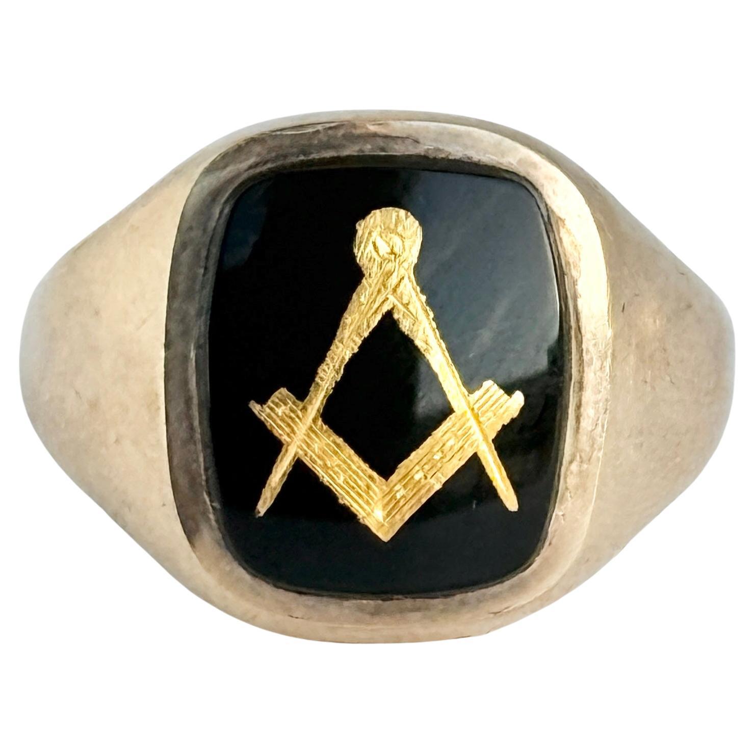 Anello massonico d
epoca con onice e oro a 9 carati