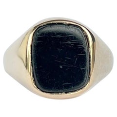 Anillo de sello vintage de ónice y oro de 9 quilates