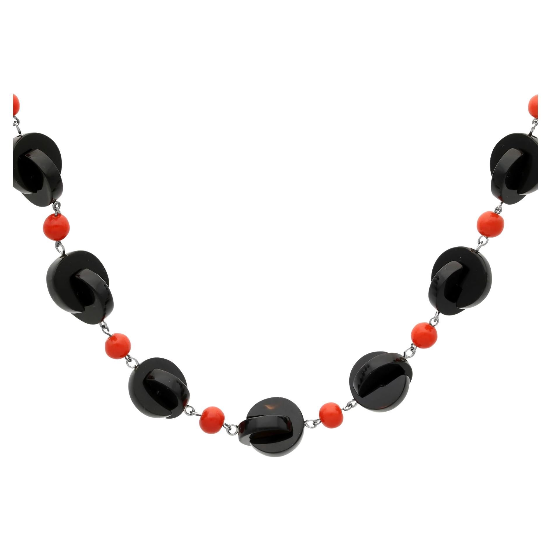 Vintage Onyx and 9.50 Carat Coral Necklace For Sale