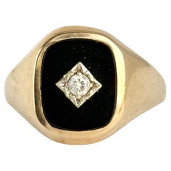 Siegelring aus 9 Karat Gold mit Onyx und Diamant