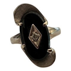 Vintage Ring aus Onyx und Diamant