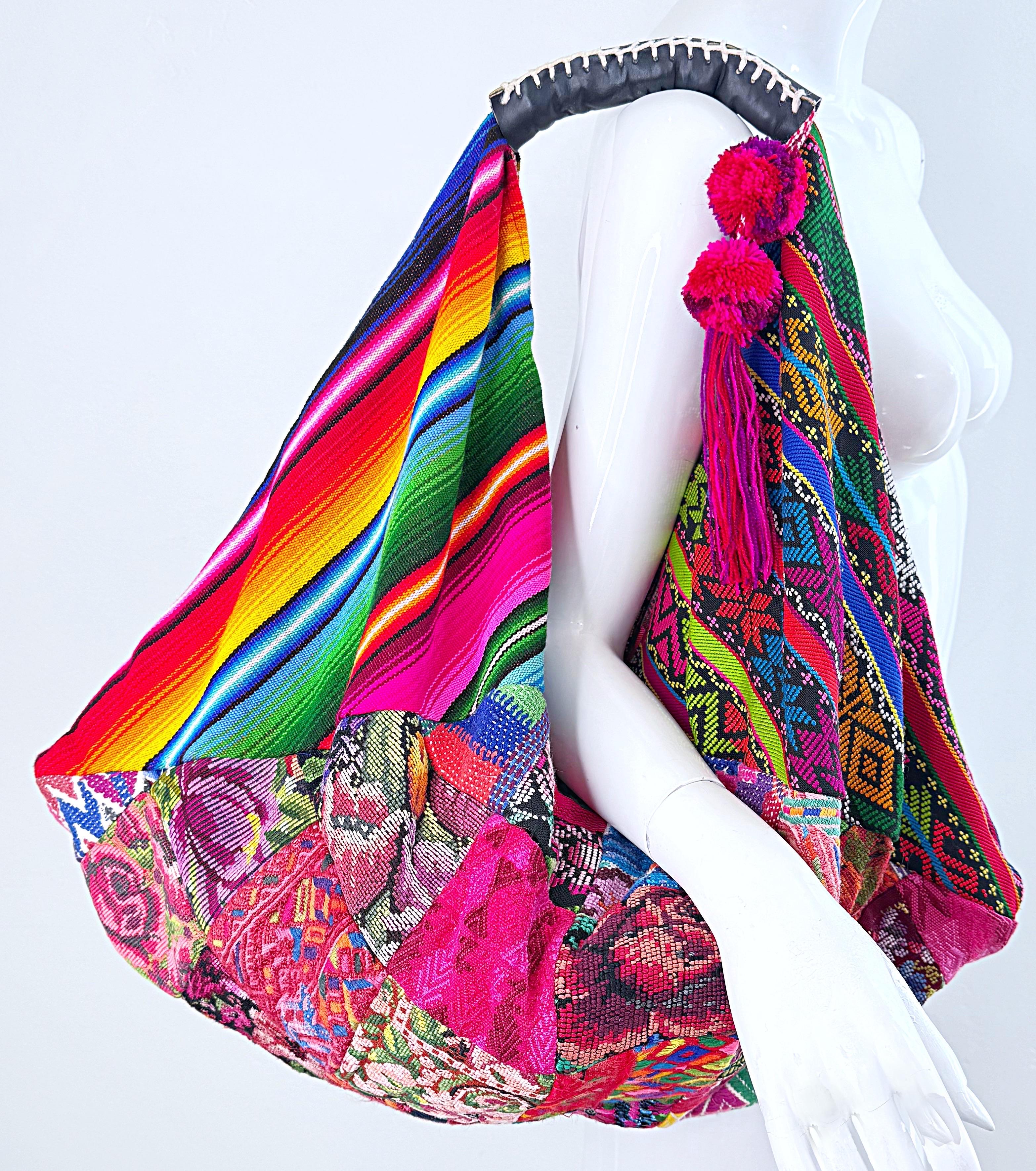 Amazing OOAK (One of a kind) Y2K hand embroidered needlepoint patchwork hobo bag ! Features vibrant colors of hot pink, green, orange, yellow, blue orange, purple, white, turquoise, etc. throughout. Two pink and purple pom poms with a tassel. Sap
