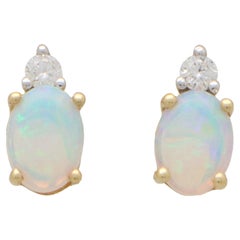 Vintage-Ohrstecker mit Opal und Diamant aus 9 Karat Gelbgold