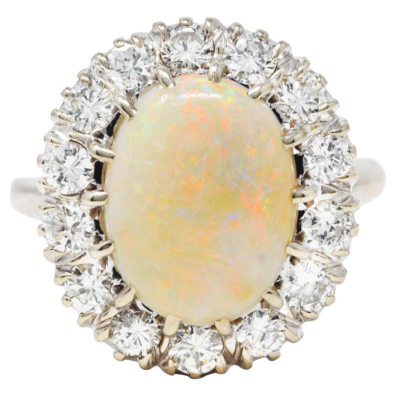 Oval Opal and Diamond Claw Set Cluster Ring 18 Karat White Gold For