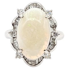 Anello cocktail con opale e diamante vintage in platino