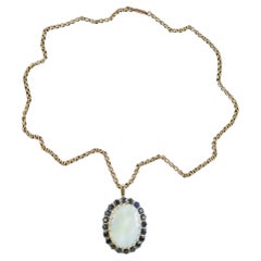 Collana vintage con zaffiro e opale in oro 9 carati e opale da 25 carati
