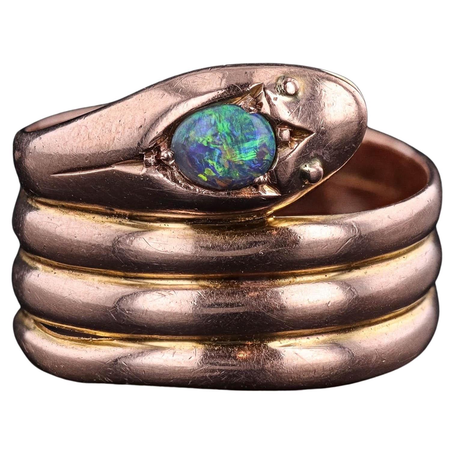 Anello a serpente con opale d
epoca in oro 9ct in vendita