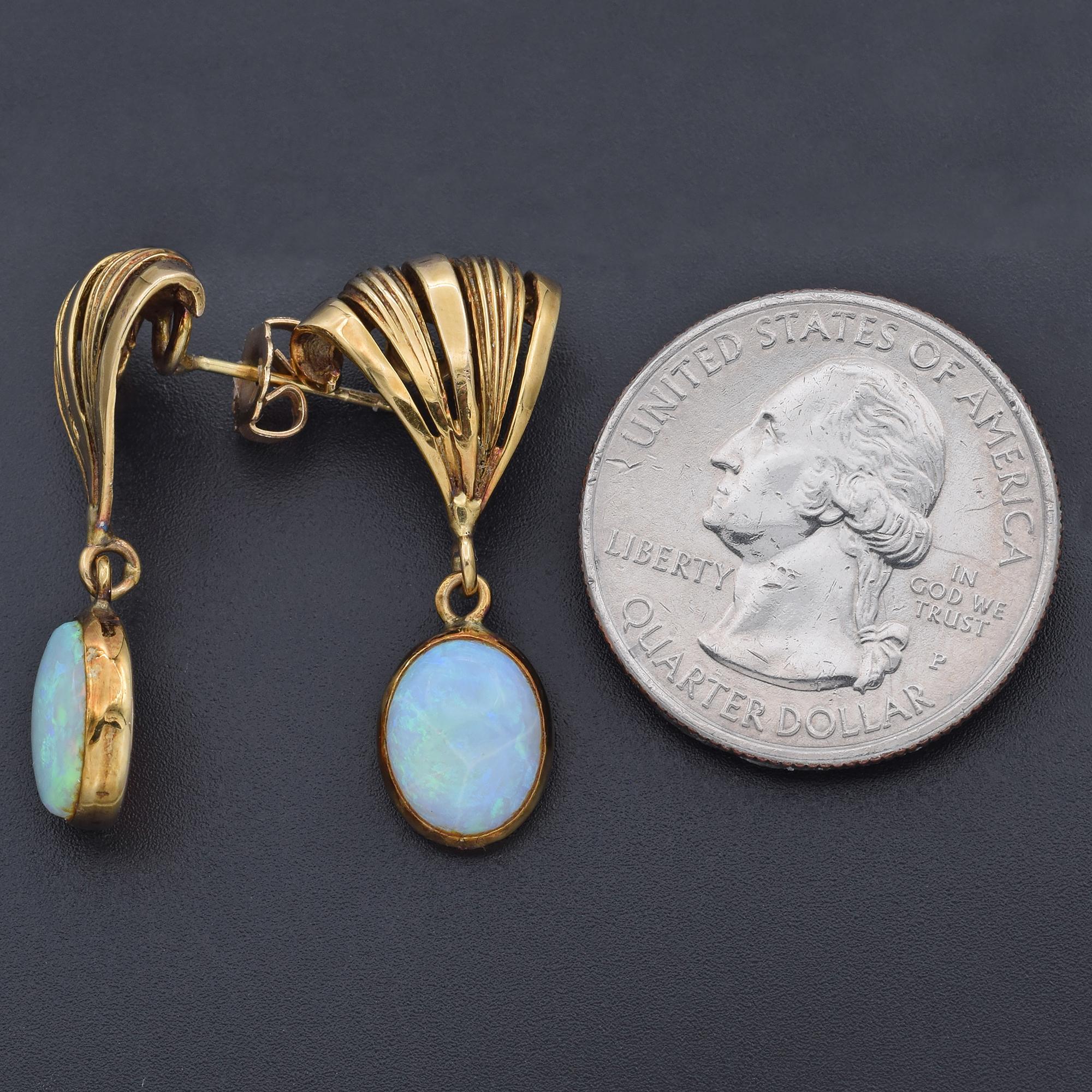 Weight: 4.9 Grams
Stone: Opal (10 x 8 mm)
Measurements: 29.5 x 14.0 mm
Hallmark: 14K

ITEM #: BR-1063-100423-16