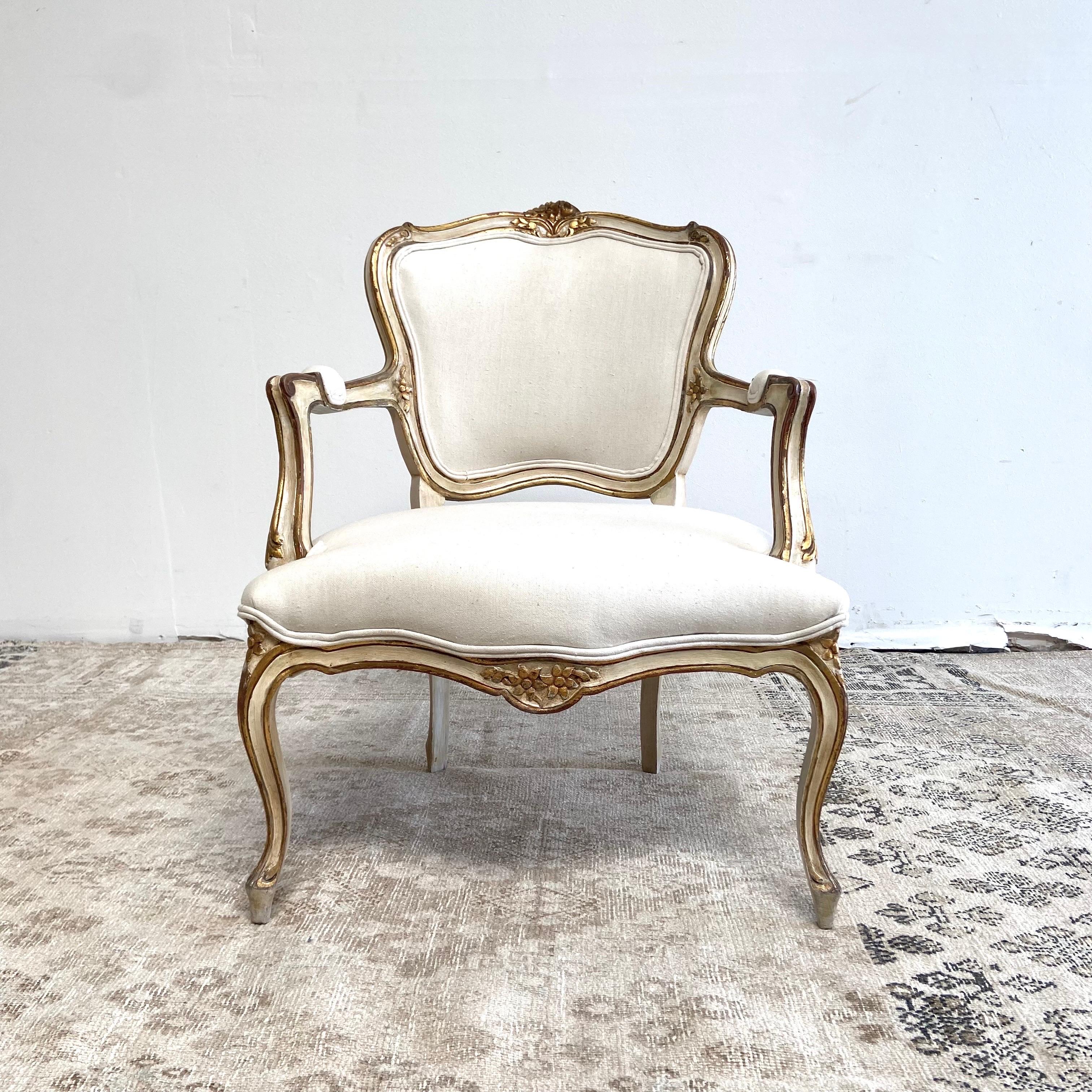 Open arm chair 27”w x 29”d x 35”h
SH: 17”. SD: 22”. AH: 25”
Louis XV Style with painted finish with subtle distressed edges and original gilt wood, upholtery in cotton linen with a double welt finish. Legs are solid and sturdy ready for everyday