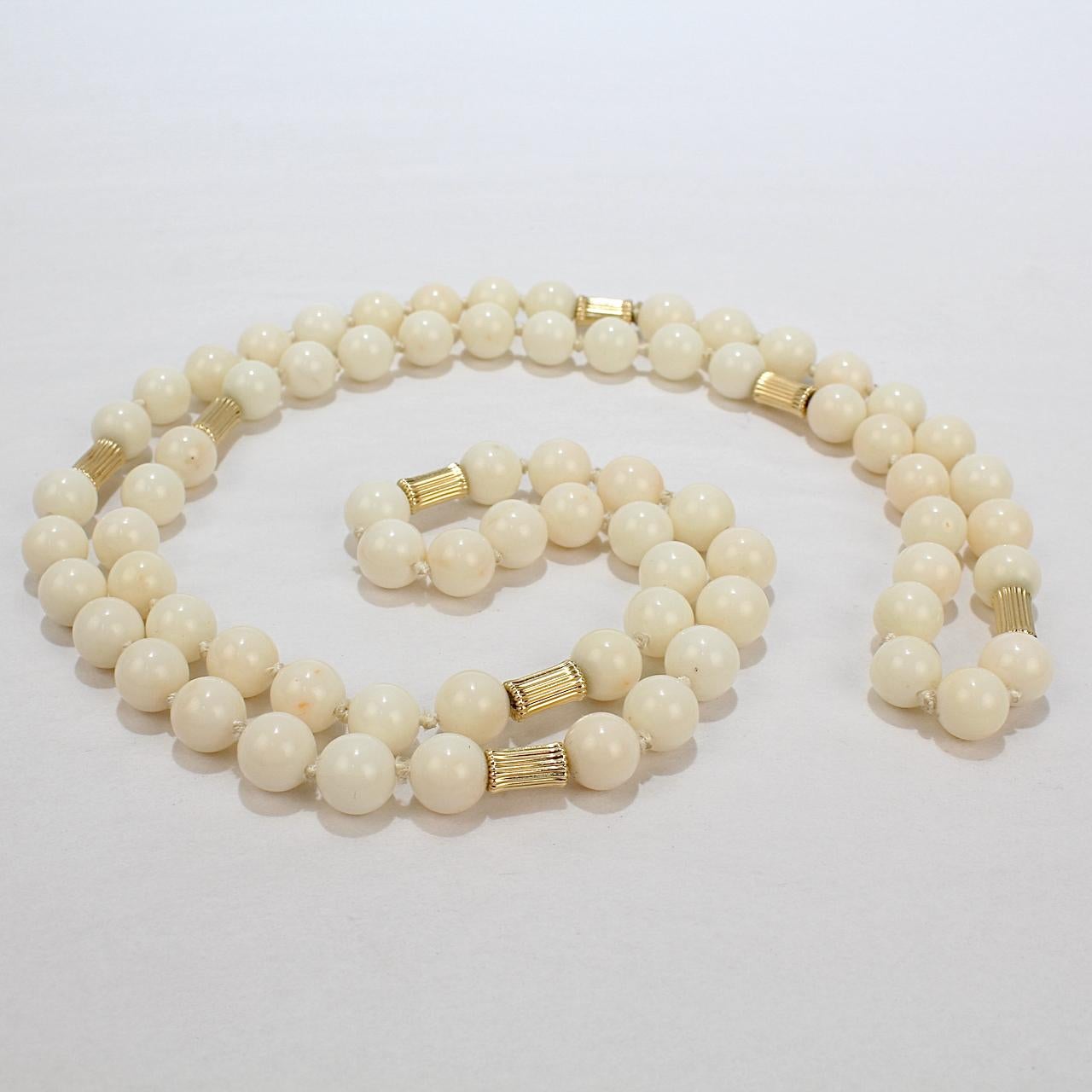 A fine vintage beaded necklace.

Comprised of 9 mm near-white coral beads that are offset with reeded gold beads.

Simply a classically beautiful necklace!

Date:
20th Century

Overall Condition:
It is in overall very good, as-pictured, used estate