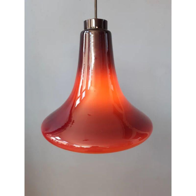 Very rare opaline pendant by Hans-Agne Jakobsson in purple colour, also known as Oplight model 65. The lamp is made out of refined, cased glass. On the pictures the lamp sometimes looks bordeaux red, but in real life it is in fact quite plain (dark)