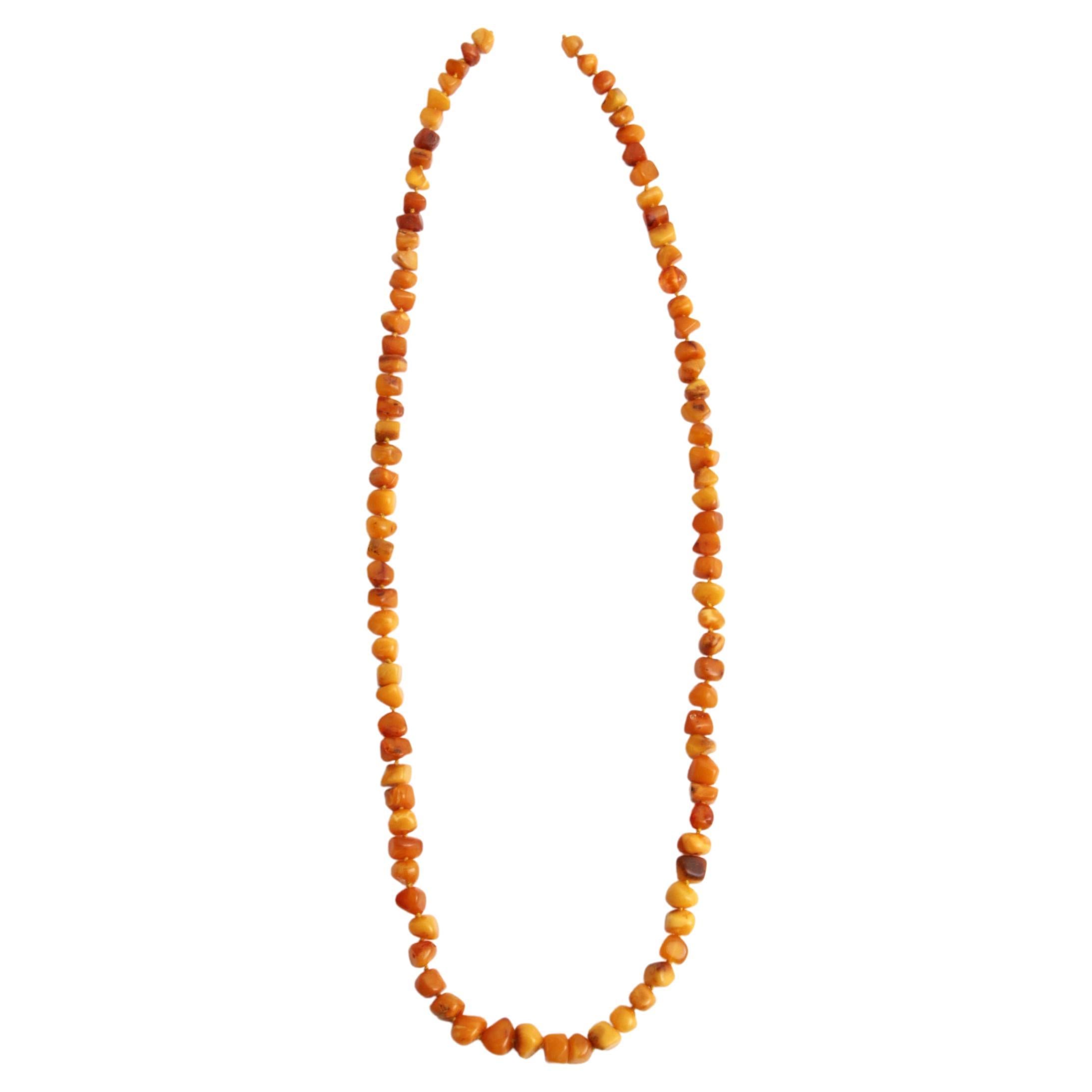 Collier de perles d'ambre orange vintage, 1960