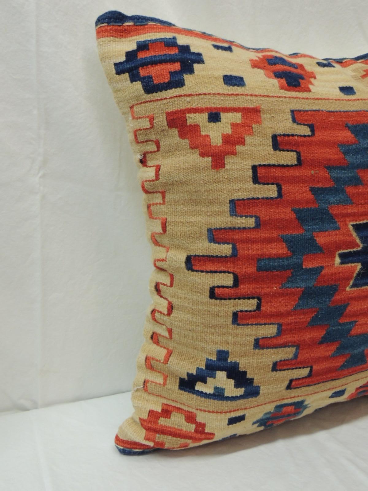 Vintage orange and blue Kilim decorative pillow.
Natural cotton backing and zipper closure.
Feather/down insert.
From George Smith shop in Soho, circa 1990s.
Size: 19.5