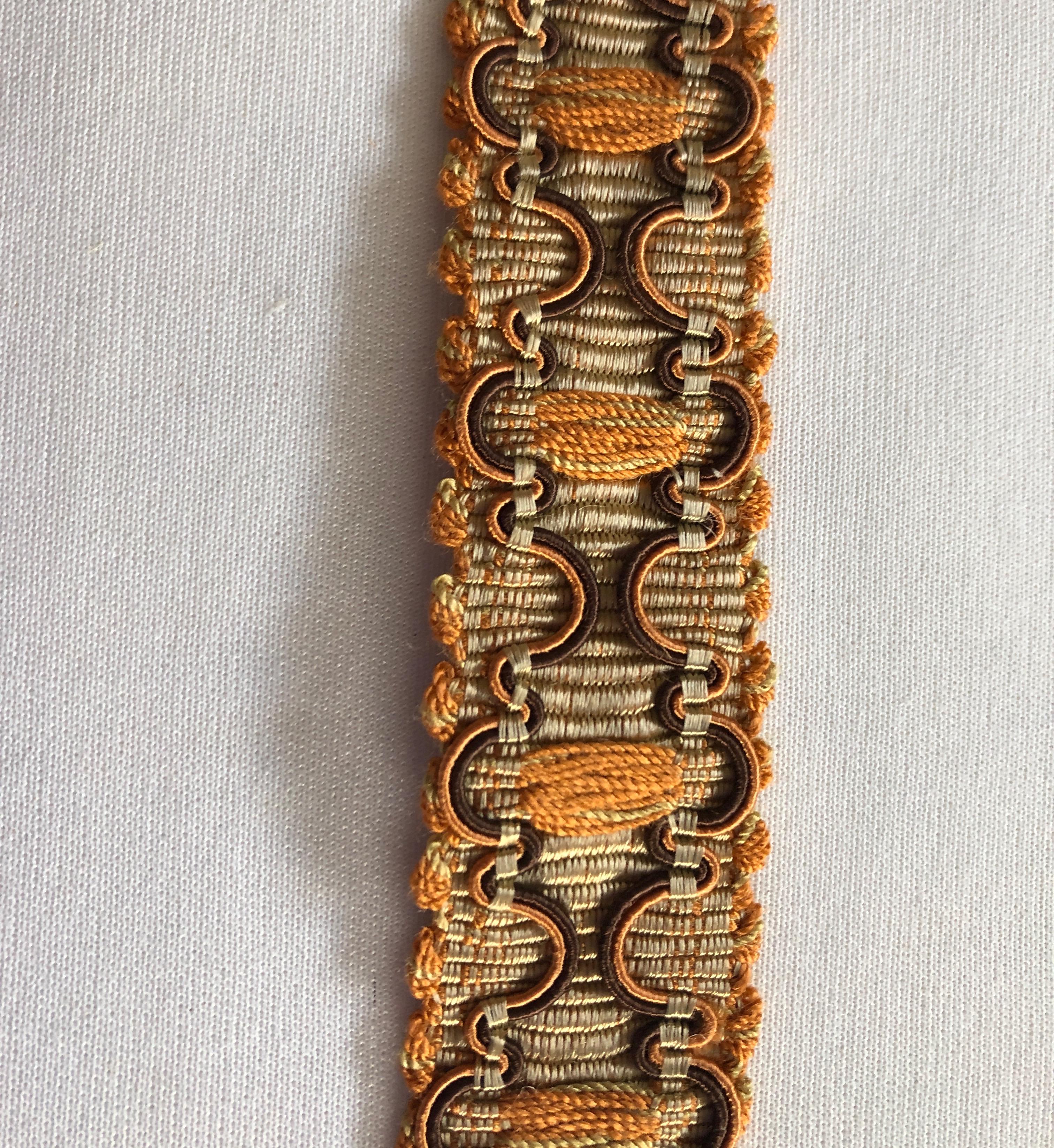 Vintage orange and brown braided gimp silk decorative trim.
Ideal for pillows, curtains and upholstery.
Sold as is.
Size: 1