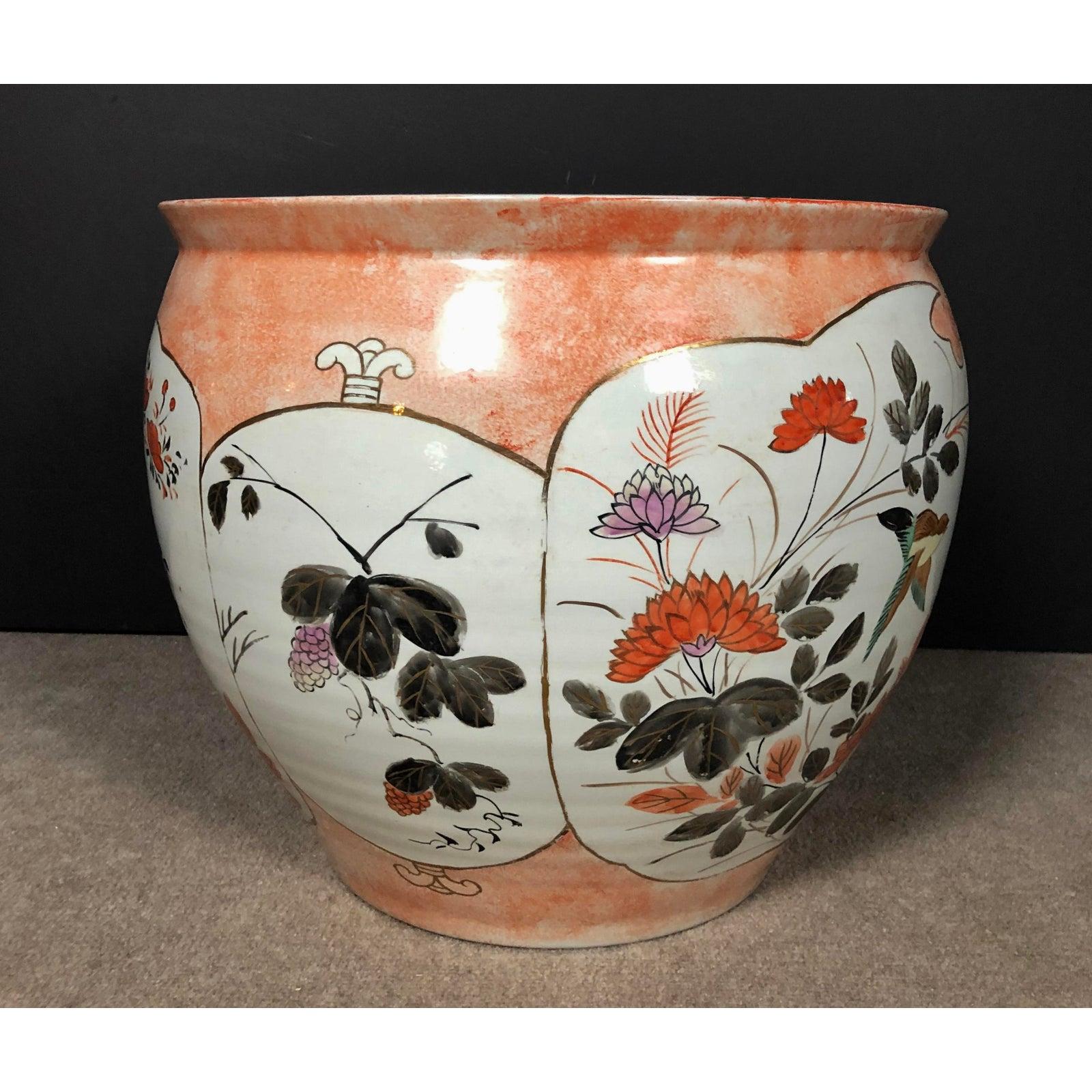 Large vintage orange and white porcelain Japanese fish bowl planter. Japanese porcelain fish bowl planter with floral and bird motif. Decoration continues on top rim as well as inside and bottom. Makers mark on bottom.