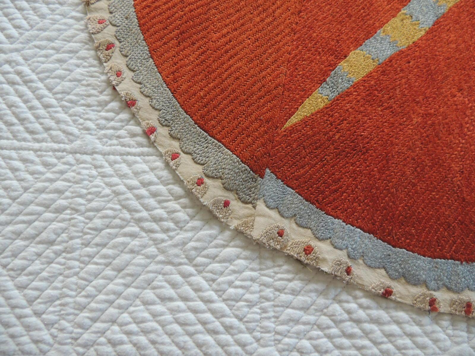 Vintage orange and yellow oval Suzani textile fragment.
Circular woven pattern with a sunburst design center.
In shades of orange, yellow, grey, natural and red.
Ideal for upholstery or to make into pillow.
Size: 20.5