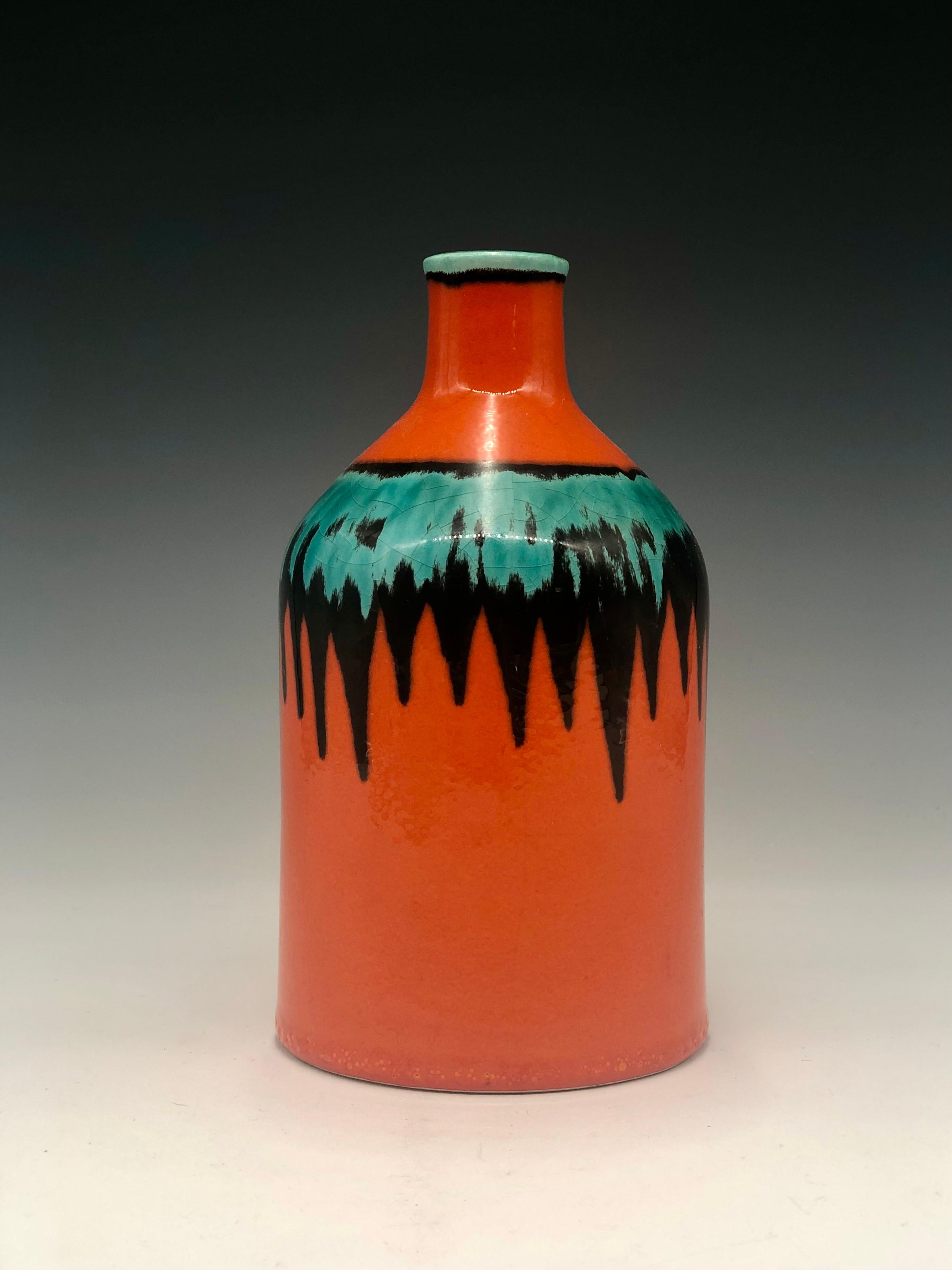 Bright, boldly colored orange, black, and aqua green mid-century vase by Cortendorf. A beautiful, bold example of West German Art Pottery from the 1950s. It has its original maker's label, 