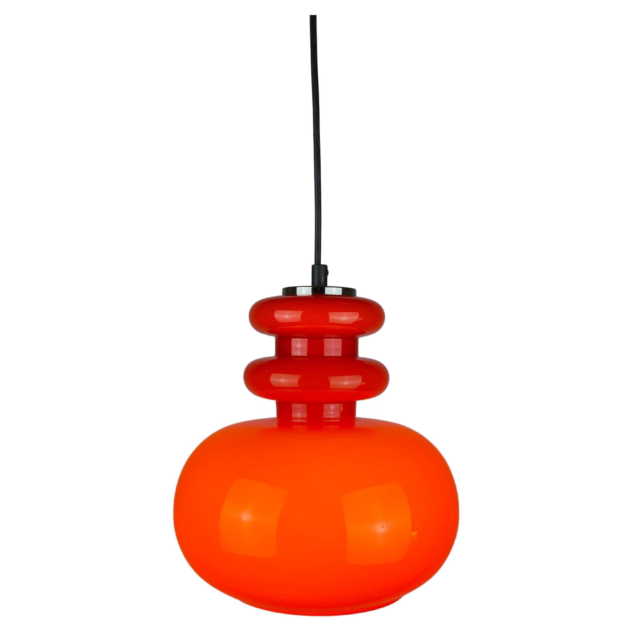 Vintage Light red glass pendant light by Peill and Putzler 1960