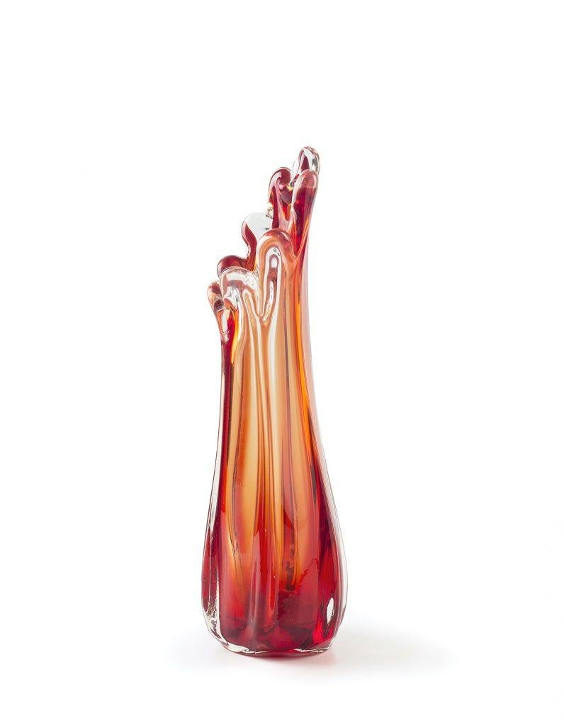 Vintage orange glass vase, with wavy mouth, realized in Northern Europe during the 1970s.

Excellent condition.

 