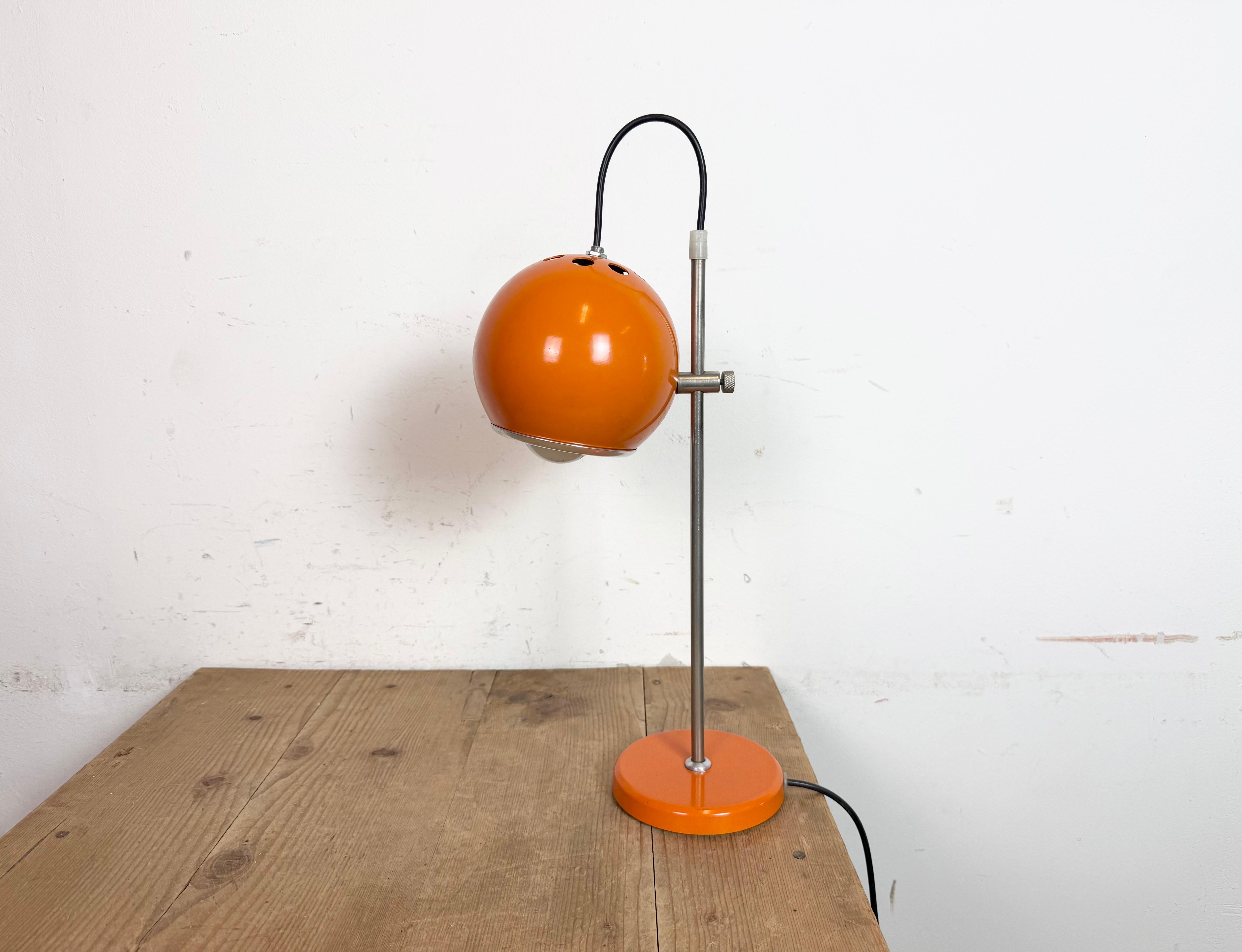 This orange table lamp was produced by Elektrofem in Hungary during the 1970s. It features a metal height adjustable lampshade, a chrome plated arm and iron base. Good vintage condition. New wire.
Lampshade diameter: 15 cm
Weight : 1,8 kg.