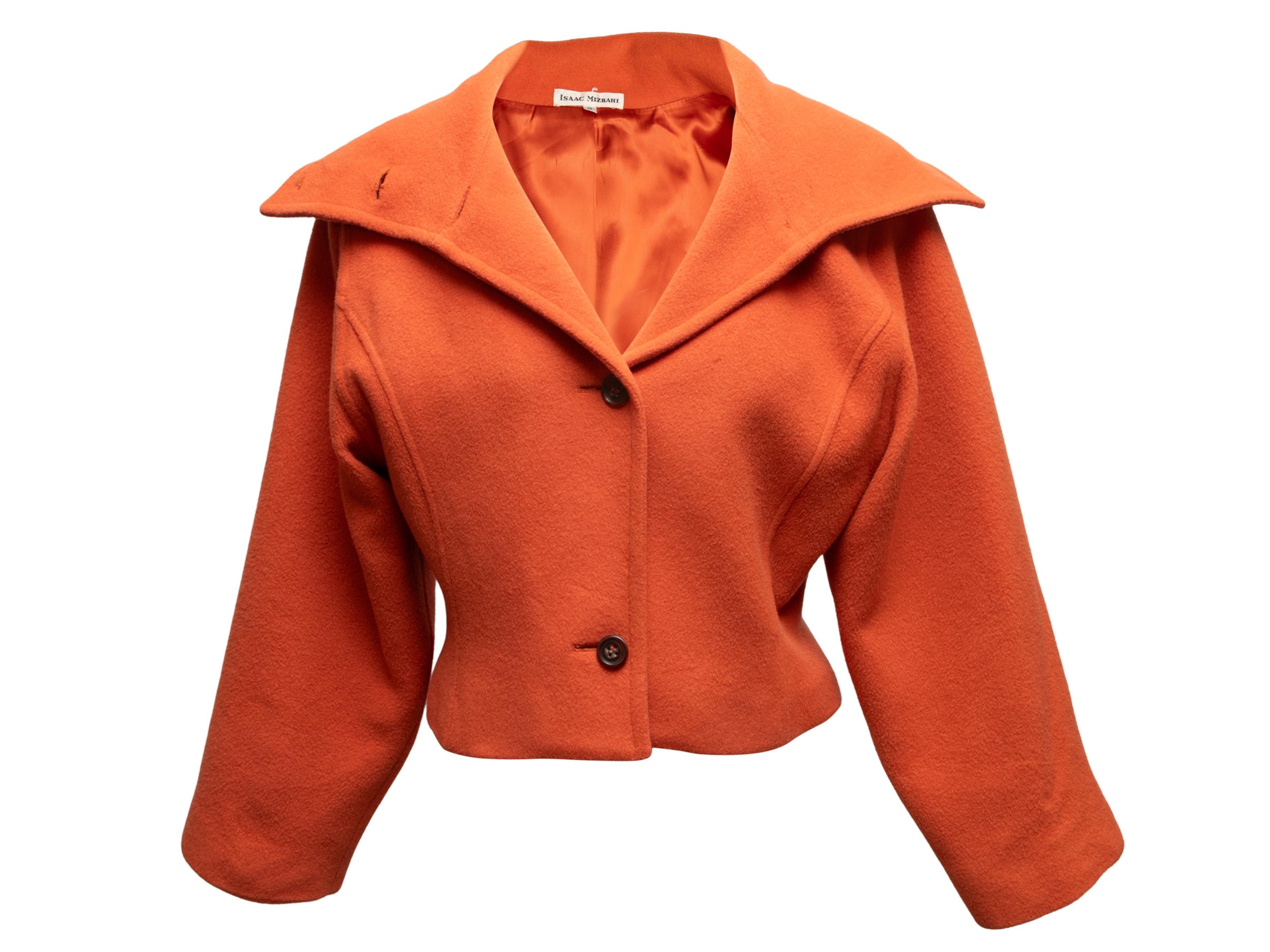Vintage orange camel hair jacket by Isaac Mizrahi. Stand collar. Button closures at center front. 35