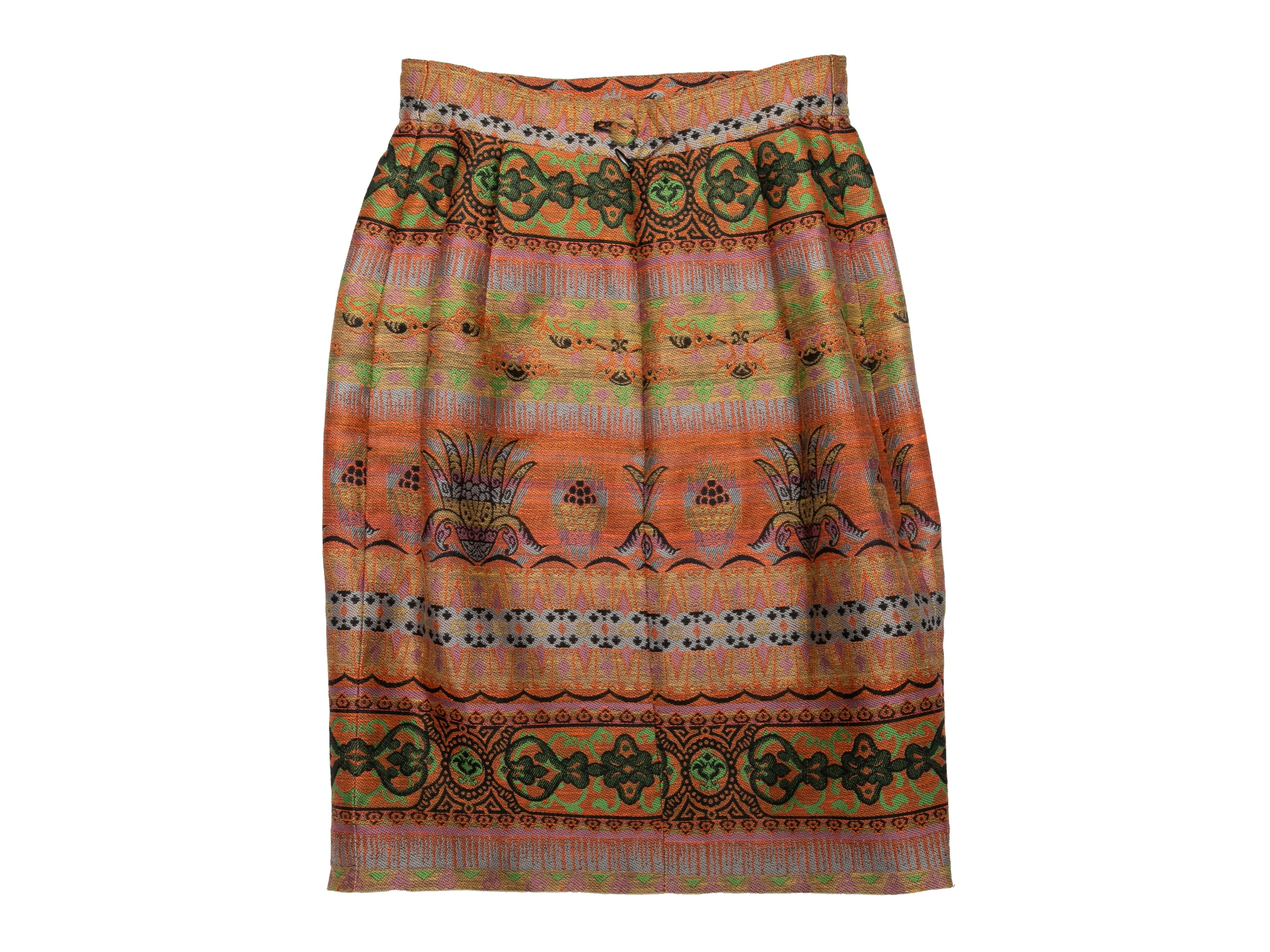 Vintage orange and multicolor jacquard patterned pencil skirt by Christian Lacroix. Closure at center back. 23