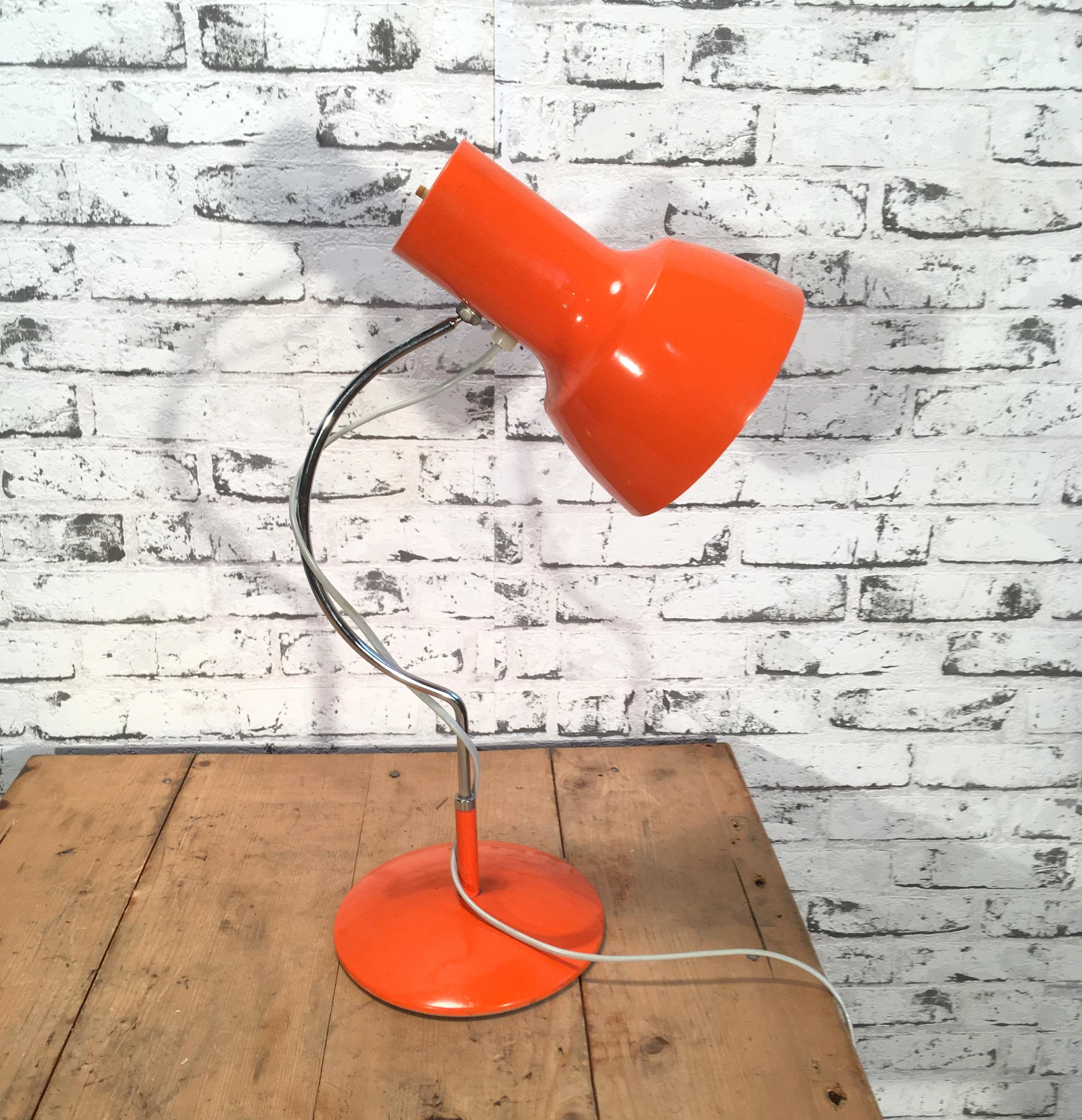 This table lamp was designed by Josef Hurka and produced in former Czechoslovakia by Napako during the 1960s. The lamp has a steel body and an aluminium lampshade. Switch is situated directly on shade. Good vintage condition. Fully