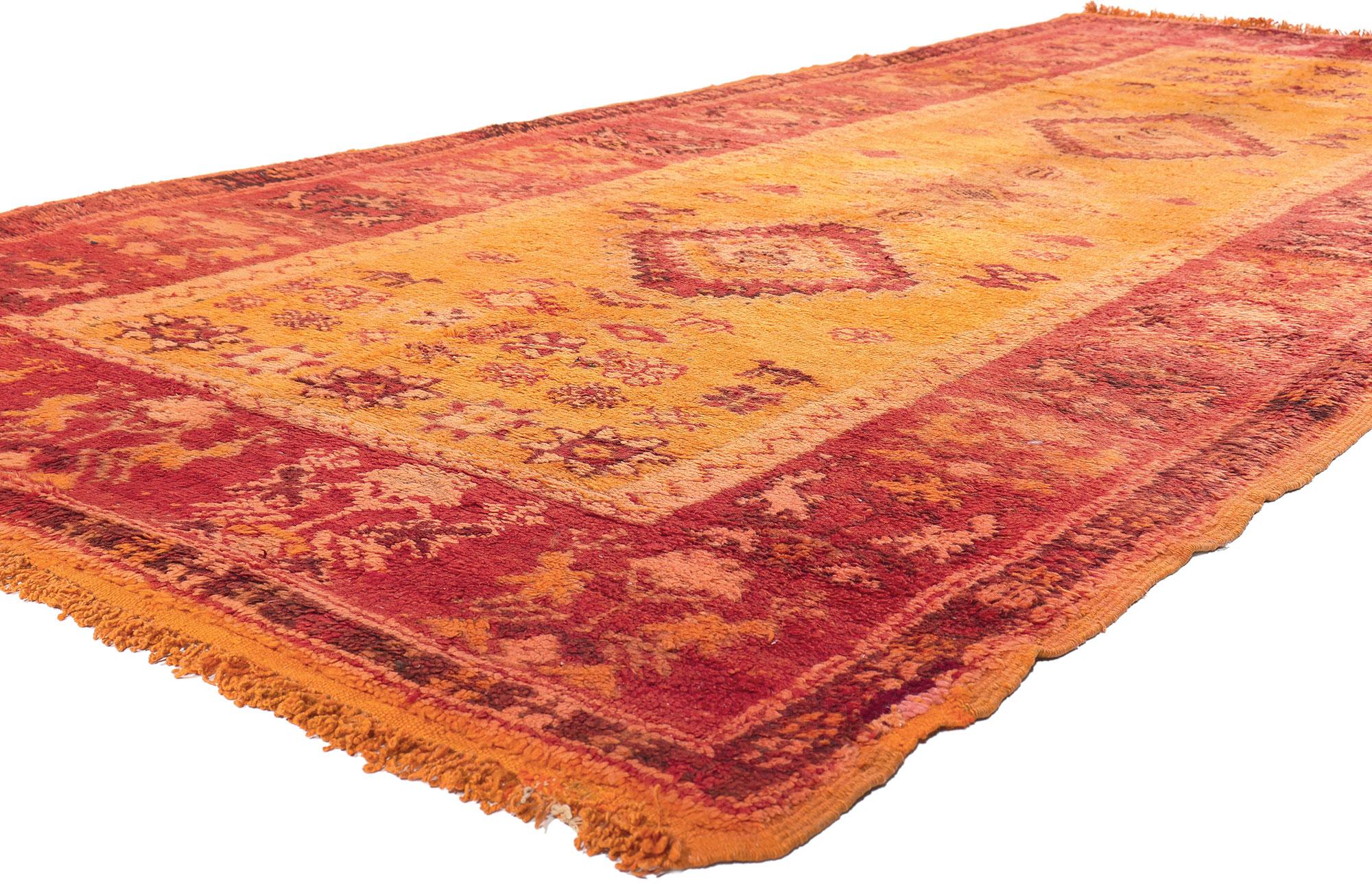 20206 Vintage Orange Taznakht Moroccan Rug, 05'07 x 13'01.

Transport yourself to the sun-soaked landscapes of the Mediterranean with this exquisite hand-knotted wool vintage Taznakht Moroccan rug. Embracing the warmth of earthy tones, this Moroccan